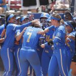 
              UCLA's Maya Brady (7) celebrates with her team at home plate following a home run during the seventh inning of an NCAA softball Women's College World Series game against Oklahoma on Monday, June 6, 2022, in Oklahoma City. UCLA won 7-3. (AP Photo/Alonzo Adams)
            