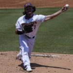 
              East Carolina pitcher C.J. Mayhue throws against Texas during the first inning of an NCAA college super regional baseball game Friday, June 10, 2022, in Greenville, N.C. (AP Photo/Chris Carlson)
            