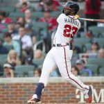 
              Atlanta Braves Michael Harris II hits a single in the third inning of a baseball game against the San Francisco Giants, Monday, June 20, 2022, in Atlanta. (AP Photo/Hakim Wright Sr.)
            