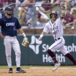 
              Texas A&M's Jordan Thompson celebrates his two-run home run against Oral Roberts in an NCAA college baseball game at the College Station Regional in College Station, Texas, Friday, June 3, 2022. (Michael Miller/College Station Eagle via AP)
            