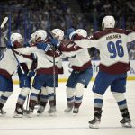 
              The Colorado Avalanche celebrate the overtime goal of center Nazem Kadri in Game 4 of the NHL hockey Stanley Cup Finals against the Tampa Bay Lightning on Wednesday, June 22, 2022, in Tampa, Fla. (AP Photo/Phelan Ebenhack)
            