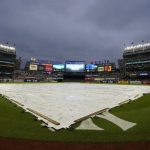 
              A tarp covers the field during a rain delay before a baseball game between the New York Yankees and the Los Angeles Angels, Wednesday, June 1, 2022, in New York. (AP Photo/Mary Altaffer)
            