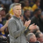
              Golden State Warriors head coach Steve Kerr watches during the first half of his team's Game 5 of basketball's NBA Finals against the Boston Celtics in San Francisco, Monday, June 13, 2022. (AP Photo/Jed Jacobsohn)
            