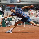 
              France's Gabriel Debru returns the ball to Belgium's Gilles Arnaud Bailly during their boys singles final match of the French Open tennis tournament at the Roland Garros stadium Saturday, June 4, 2022 in Paris. (AP Photo/Jean-Francois Badias)
            