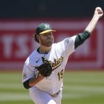 
              Oakland Athletics' Cole Irvin pitches against the Kansas City Royals during the first inning of a baseball game in Oakland, Calif., Saturday, June 18, 2022. (AP Photo/Jeff Chiu)
            