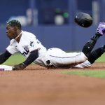 
              Miami Marlins' Jazz Chisholm Jr. is out stealing second during the first inning of a baseball game against the Colorado Rockies, Wednesday, June 22, 2022, in Miami. (AP Photo/Lynne Sladky)
            