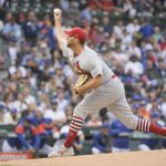 
              St. Louis Cardinals starting pitcher Adam Wainwright throws against the Chicago Cubs during the first inning of a baseball game, Sunday, June 5, 2022, at Wrigley Field in Chicago. (AP Photo/Mark Black)
            