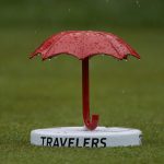 
              A small umbrella marks the tee box during the Travelers Celebrity Pro-Am golf tournament at TPC River Highlands, Wednesday, June 22, 2022, in Cromwell, Conn. This week's Travelers Championship will feature six of the world's top 15 ranked players, including No. 1 Scottie Scheffler and No. 2 Rory McIlroy. McIlroy, who won the Canadian Open earlier this month and then finished tied for fifth at last week's U.S. Open, is playing in his fourth straight event. (AP Photo/Seth Wenig)
            