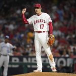 
              Los Angeles Angels starting pitcher Shohei Ohtani (17) reacts after walking Kansas City Royals' Whit Merrifield during the sixth inning of a baseball game in Anaheim, Calif., Wednesday, June 22, 2022. (AP Photo/Ashley Landis)
            