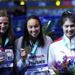 
              Silver medalist Marie Wattel of France, gold medalist Torri Huske of the United States and bronze medalist Zhang Yufei of China, from left to right, pose after competing in the Women 100m Butterfly final at the 19th FINA World Championships in Budapest, Hungary, Sunday, June 19, 2022. (AP Photo/Petr David Josek)
            