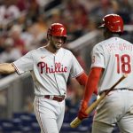 
              Philadelphia Phillies' Matt Vierling, left, celebrates his solo home run with teammate Didi Gregorius in the eighth inning of the second game of a baseball doubleheader against the Washington Nationals, Friday, June 17, 2022, in Washington. Philadelphia won 8-7 in 10 innings. (AP Photo/Patrick Semansky)
            
