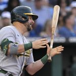 
              Oakland Athletics' Stephen Vogt tosses his bat after striking out during the second inning of the team's baseball game against the Kansas City Royals, Friday, June 24, 2022, in Kansas City, Mo. (AP Photo/Reed Hoffmann)
            