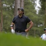 
              Phil Mickelson of the United States watches the flight of his ball after playing off the 4th tee during the first round of the inaugural LIV Golf Invitational at the Centurion Club in St. Albans, England, Thursday, June 9, 2022. (AP Photo/Alastair Grant)
            