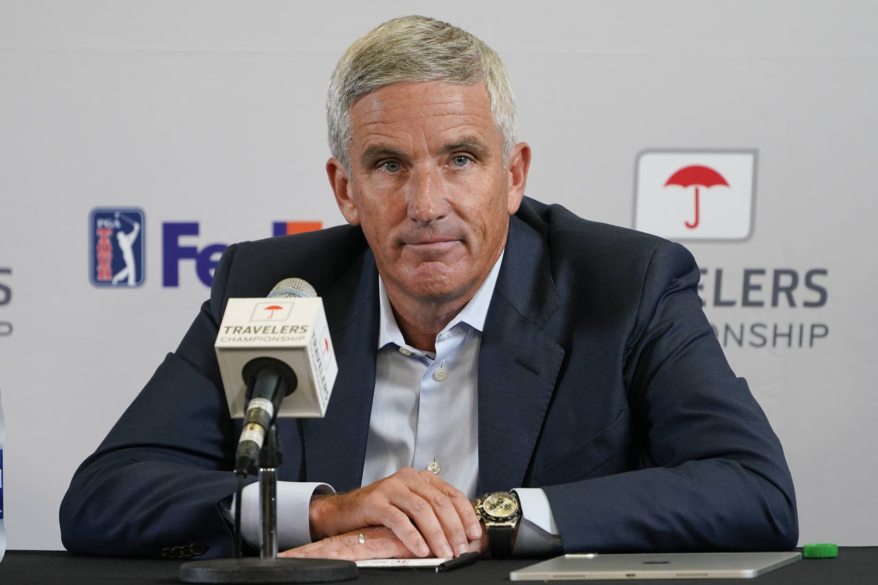 PGA Tour Commissioner Jay Monahan speaks during a news conference before the start of the Travelers...