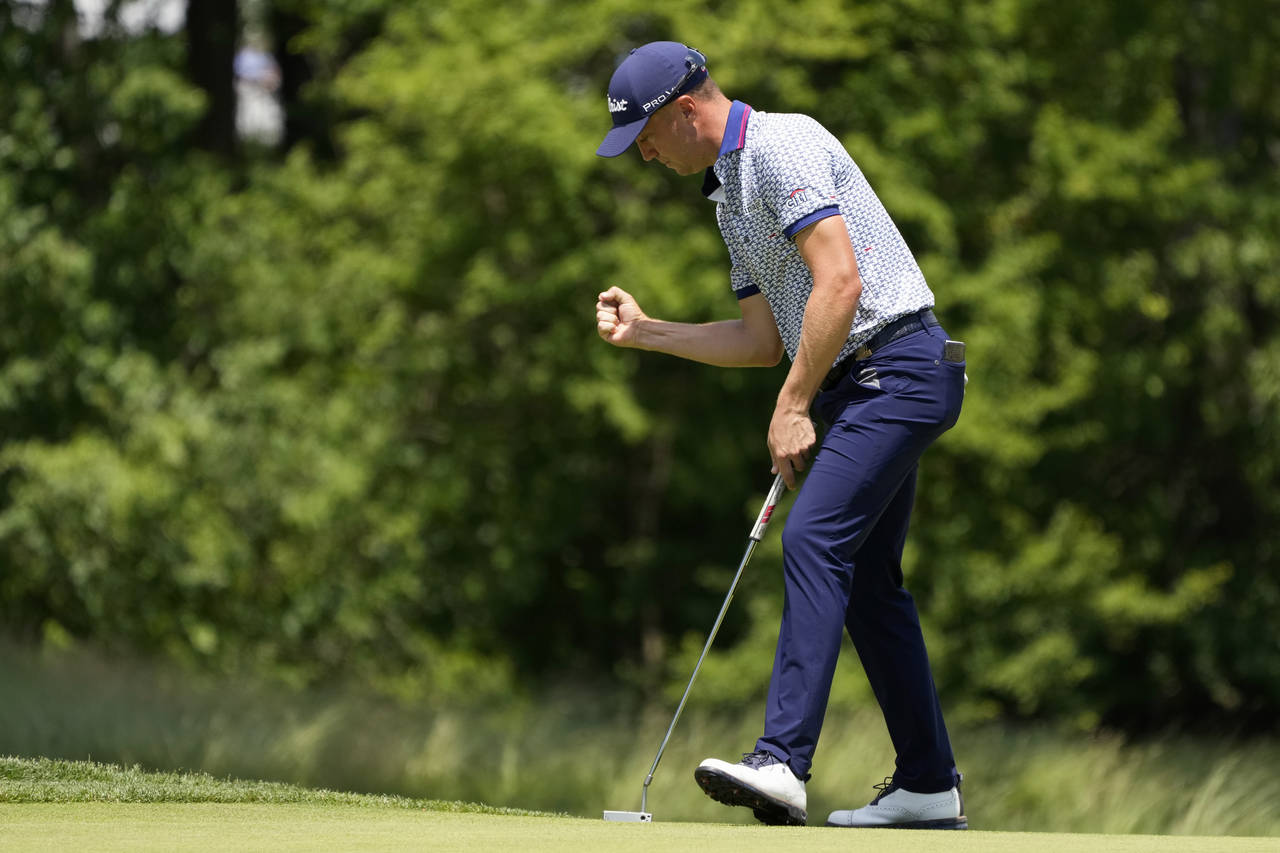 Justin Thomas reacts after a putt on the ninth hole during the second round of the U.S. Open golf t...