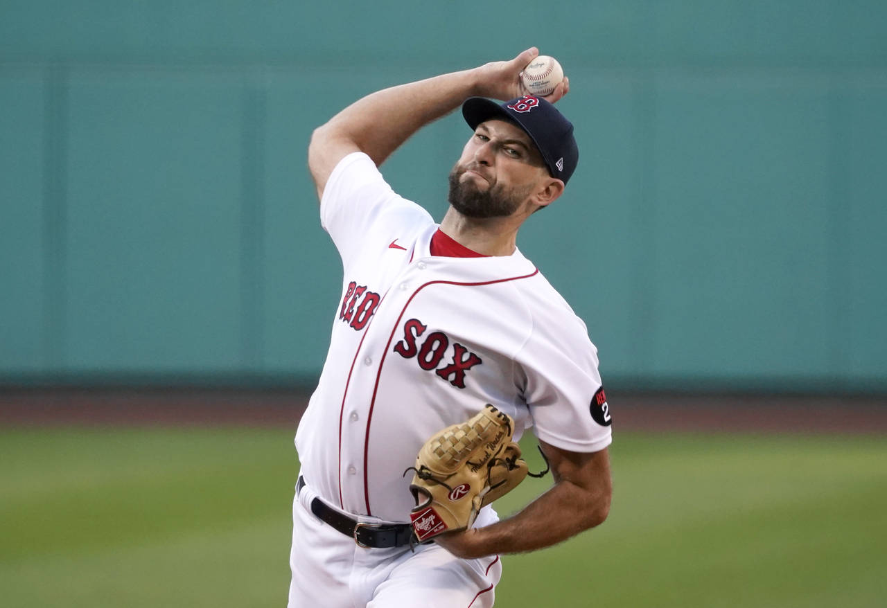 Boston Red Sox starting pitcher Michael Wacha throws during the first inning of the team's baseball...