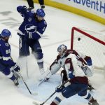 
              Tampa Bay Lightning left wing Pat Maroon (14) scores past Colorado Avalanche goaltender Darcy Kuemper (35) during the second period of Game 3 of the NHL hockey Stanley Cup Final on Monday, June 20, 2022, in Tampa, Fla. (AP Photo/Chris O'Meara)
            
