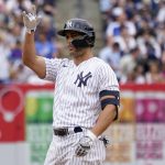 
              New York Yankees' Giancarlo Stanton gestures after hitting an RBI-double in the third inning of a baseball game against the Chicago Cubs, Sunday, June 12, 2022, in New York. (AP Photo/Mary Altaffer)
            