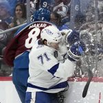
              Tampa Bay Lightning center Anthony Cirelli (71) collides with Colorado Avalanche defenseman Cale Makar during the first period in Game 2 of the NHL hockey Stanley Cup Final, Saturday, June 18, 2022, in Denver. (AP Photo/John Locher)
            
