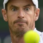 
              Britain's Andy Murray eyes the ball before playing a return to Australia's James Duckworth in a first round men's singles match on day one of the Wimbledon tennis championships in London, Monday, June 27, 2022. (AP Photo/Kirsty Wigglesworth)
            