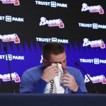 
              Los Angeles Dodgers' Freddie Freeman, formerly of the Atlanta Braves, becomes emotional during a pregame baseball news conference before taking on his former team, Friday, June 24, 2022, in Atlanta. (Curtis Compton/Atlanta Journal-Constitution via AP)
            