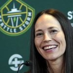 
              SFILE - Seattle Storm guard Sue Bird smiles as she talks about her return for one more WNBA basketball season during a news conference o, Feb. 22, 2022, in Seattle. The Seattle Storm star and five-time Olympic gold medalist announced Thursday, June 16, 2022, that the 2022 season will be her last playing in the WNBA. (AP Photo/Elaine Thompson, File)
            
