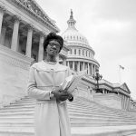 
              FILE - Rep. Shirley Chisholm D-N.Y., poses on the steps of the Capitol in Washington, March 26, 1969. The arrival of Title IX and its protections for American women was a long time coming and the result of hard work from the likes of Jeannette Rankin, Shirley Chisholm, Eleanor Roosevelt, Patsy Mink and more. (AP Photo/Charles Gorry, File)
            