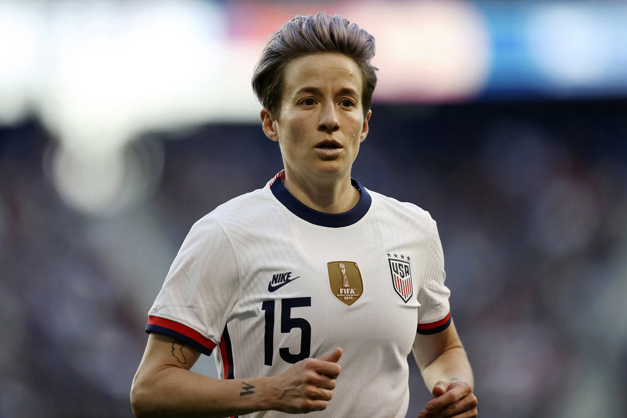 FILE -  o, U.S. forward Megan Rapinoe runs during the second half of a SheBelieves Cup soccer match...