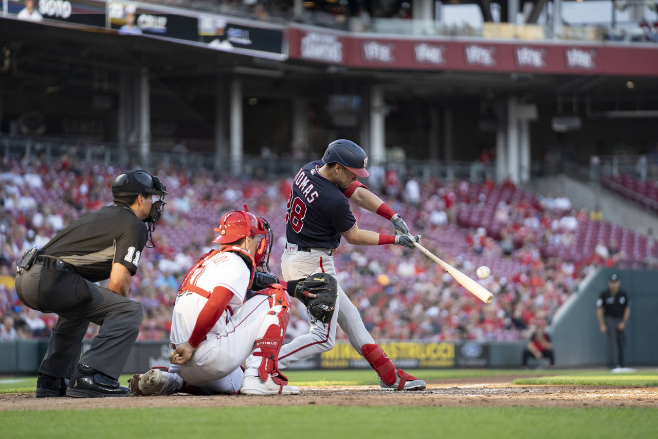 Washington Nationals' Lane Thomas (28) hits a solo home run during the fifth inning of the team's b...