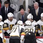 
              FILE - Vegas Golden Knights head coach Peter DeBoer, center, talks to players during the third period of an NHL hockey game against the Chicago Blackhawks in Chicago, Wednesday, April 27, 2022. The Dallas Stars announced Tuesday, June 21, 2022, that they have hired Peter DeBoer as their new coach, a month after he was fired by the Vegas Golden Knights.(AP Photo/Nam Y. Huh, File)
            