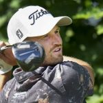 
              Wyndham Clark hits his tee shot on the 14th hole during round two of the Canadian Open golf tournament at St. George's Golf and Country Club in Toronto, Friday, June 10, 2022. (Nathan Denette/The Canadian Press via AP)
            