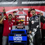 
              Todd Gilliland, center right, celebrates in Victory Lane after winning the NASCAR Truck Series auto race Saturday, June 18, 2022, at Knoxville Raceway in Knoxville, Iowa. (Joseph Cress/Iowa City Press-Citizen via AP)
            