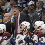 
              Colorado Avalanche head coach Jared Bednar talks to his team during the first period of Game 6 of the NHL hockey Stanley Cup Finals against the Tampa Bay Lightning on Sunday, June 26, 2022, in Tampa, Fla. (AP Photo/Phelan Ebenhack)
            