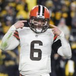 
              FILE - Cleveland Browns quarterback Baker Mayfield (6) gestures during the second half an NFL football game against the Pittsburgh Steelers, Monday, Jan. 3, 2022, in Pittsburgh. Baker Mayfield said the Cleveland Browns have work ahead if they want him to help them through their situation with Deshaun Watson. Mayfield, speaking at his football camp near the University of Oklahoma’s campus on Tuesday, June 28, didn’t entirely close the door on stepping in if needed.(AP Photo/Don Wright, File)
            