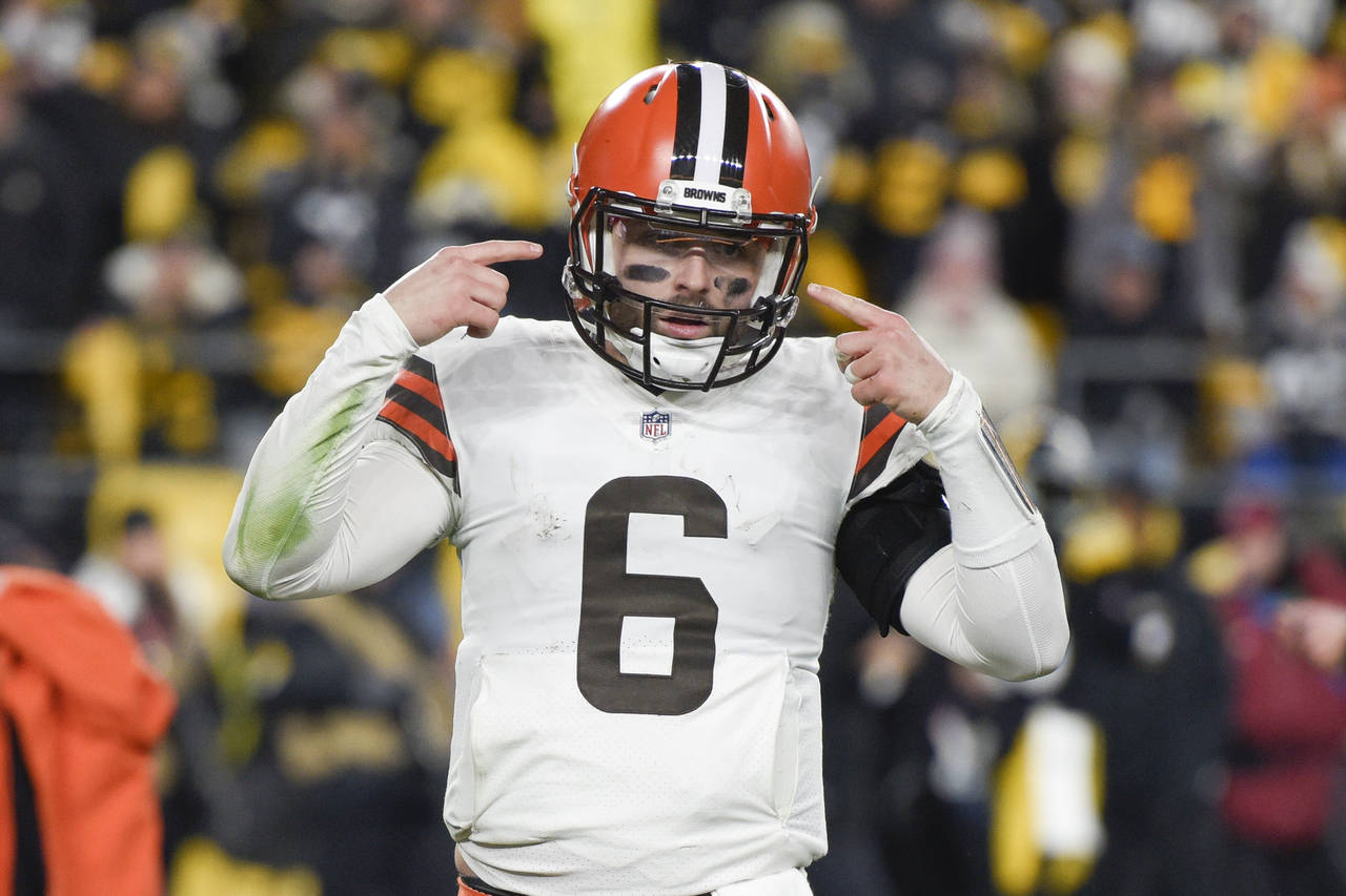 FILE - Cleveland Browns quarterback Baker Mayfield (6) gestures during the second half an NFL footb...