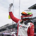 
              FILE - Simona de Silvestro, of Switzerland, waves to fans during qualifications for the Indianapolis 500 auto race at Indianapolis Motor Speedway on May 23, 2021, in Indianapolis. de Silvestro will make her IndyCar season debut Sunday, June 12, 2022, at Road America, joining Tatiana Calderon in the field to give IndyCar two women entering multiple events for the first time since 2013. (AP Photo/Darron Cummings, File)
            