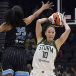 
              FILE - Seattle Storm guard Sue Bird (10) passes around the defense of Chicago Sky guard Rebekah Gardner (35) during the second half of a WNBA basketball game on May 18, 2022, in Seattle. The Seattle Storm star and five-time Olympic gold medalist announced Thursday, June 16, 2022, that the 2022 season will be her last playing in the WNBA. (AP Photo/Ted S. Warren, File)
            