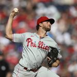 
              Philadelphia Phillies starting pitcher Aaron Nola throws during the third inning of a baseball game against the Washington Nationals, Saturday, June 18, 2022, in Washington. (AP Photo/Nick Wass)
            