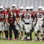 
              FILE - Arizona Cardinals training camp coach Jen Welter watches practice during NFL football training camp Wednesday, Aug. 26, 2015, in Glendale, Ariz. (Michael Chow/The Arizona Republic via AP, File)
            
