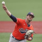 
              Auburn pitcher Mason Barnett throws against Oregon State during the first inning of an NCAA college baseball tournament super regional game on Monday, June 13, 2022, in Corvallis, Ore. (AP Photo/Amanda Loman)
            