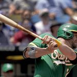 
              Oakland Athletics' Stephen Vogt watches his RBI single during the fourth inning of a baseball game against the Kansas City Royals Sunday, June 26, 2022, in Kansas City, Mo. (AP Photo/Charlie Riedel)
            