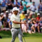 
              Xander Schauffele walk on the eighth green during the second round of the Travelers Championship golf tournament at TPC River Highlands, Friday, June 24, 2022, in Cromwell, Conn. (AP Photo/Seth Wenig)
            
