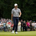 
              Rory McIlroy, of Northern Ireland, reacts after a shot on the 12th green during the first round of the Travelers Championship golf tournament at TPC River Highlands, Thursday, June 23, 2022, in Cromwell, Conn. (AP Photo/Seth Wenig)
            