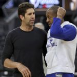 
              Golden State Warriors general manager Bob Myers, left, speaks with forward Andre Iguodala, right, during NBA basketball practice in San Francisco, Wednesday, June 1, 2022. The Warriors are scheduled to host the Boston Celtics in Game 1 of the NBA Finals on Thursday. (AP Photo/Jed Jacobsohn)
            