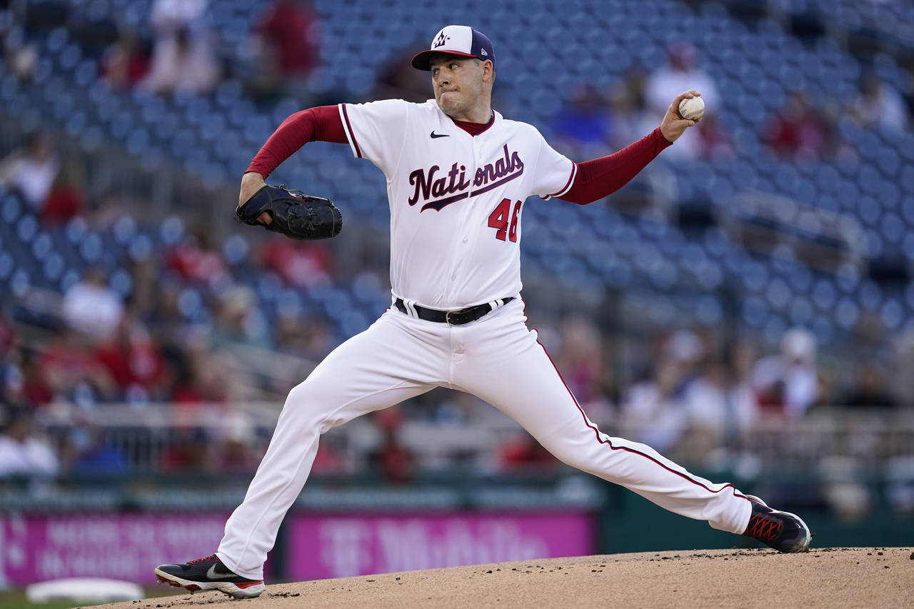 Washington Nationals starting pitcher Patrick Corbin throws during the first inning of the team's b...