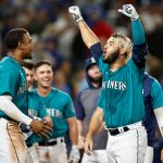 SEATTLE, WASHINGTON - JULY 08: Eugenio Suarez #28 of the Seattle Mariners reacts after his walk-off three run home run against the Toronto Blue Jays during the eleventh inning at T-Mobile Park on July 08, 2022 in Seattle, Washington. (Photo by Steph Chambers/Getty Images)