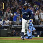 SEATTLE, WASHINGTON - JULY 09: Carlos Santana #41 of the Seattle Mariners flips his bat after hitting a two run home run during the seventh inning against the Toronto Blue Jays at T-Mobile Park on July 09, 2022 in Seattle, Washington. (Photo by Alika Jenner/Getty Images)