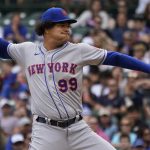 
              New York Mets starting pitcher Taijuan Walker throws against the Chicago Cubs during the first inning of the first game of a baseball doubleheader in Chicago, Saturday, July 16, 2022. (AP Photo/Nam Y. Huh)
            
