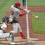 
              Philadelphia Phillies' Alec Bohm hits an RBI single off Pittsburgh Pirates starting pitcher Zach Thompson during the second inning of a baseball game in Pittsburgh, Thursday, July 28, 2022. (AP Photo/Gene J. Puskar)
            