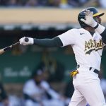 
              Oakland Athletics' Tony Kemp watches his two-run double against the Houston Astros during the fourth inning of a baseball game in Oakland, Calif., Monday, July 25, 2022. (AP Photo/Jeff Chiu)
            